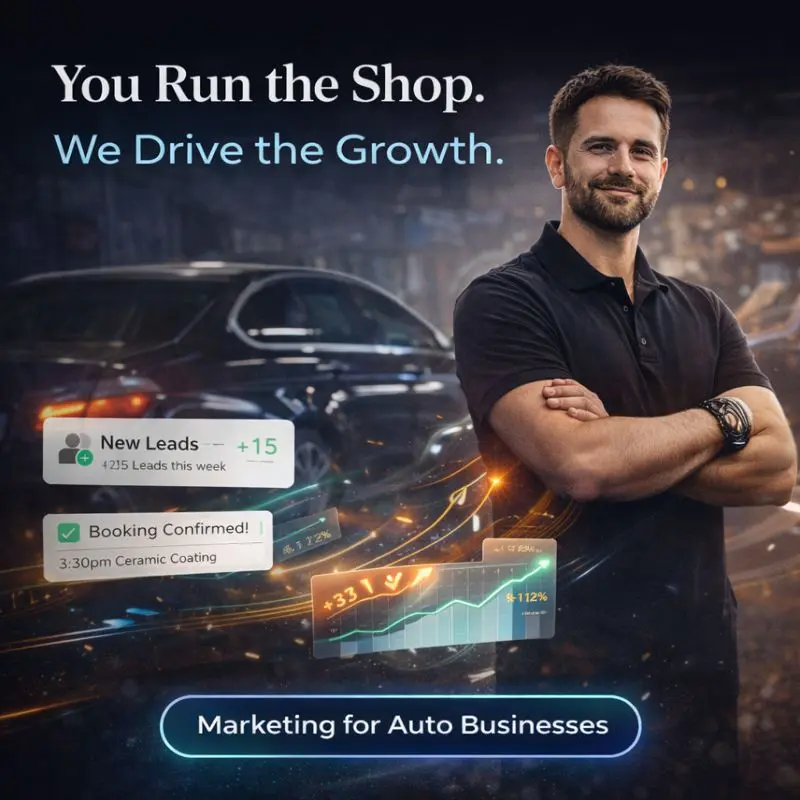 Car detailing business owner standing proudly in front of shop