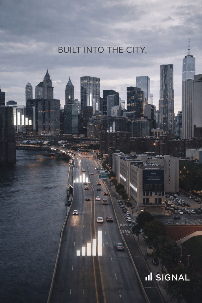Aerial view of New York City traffic with digital signal bar overlays for Signal connectivity campaign